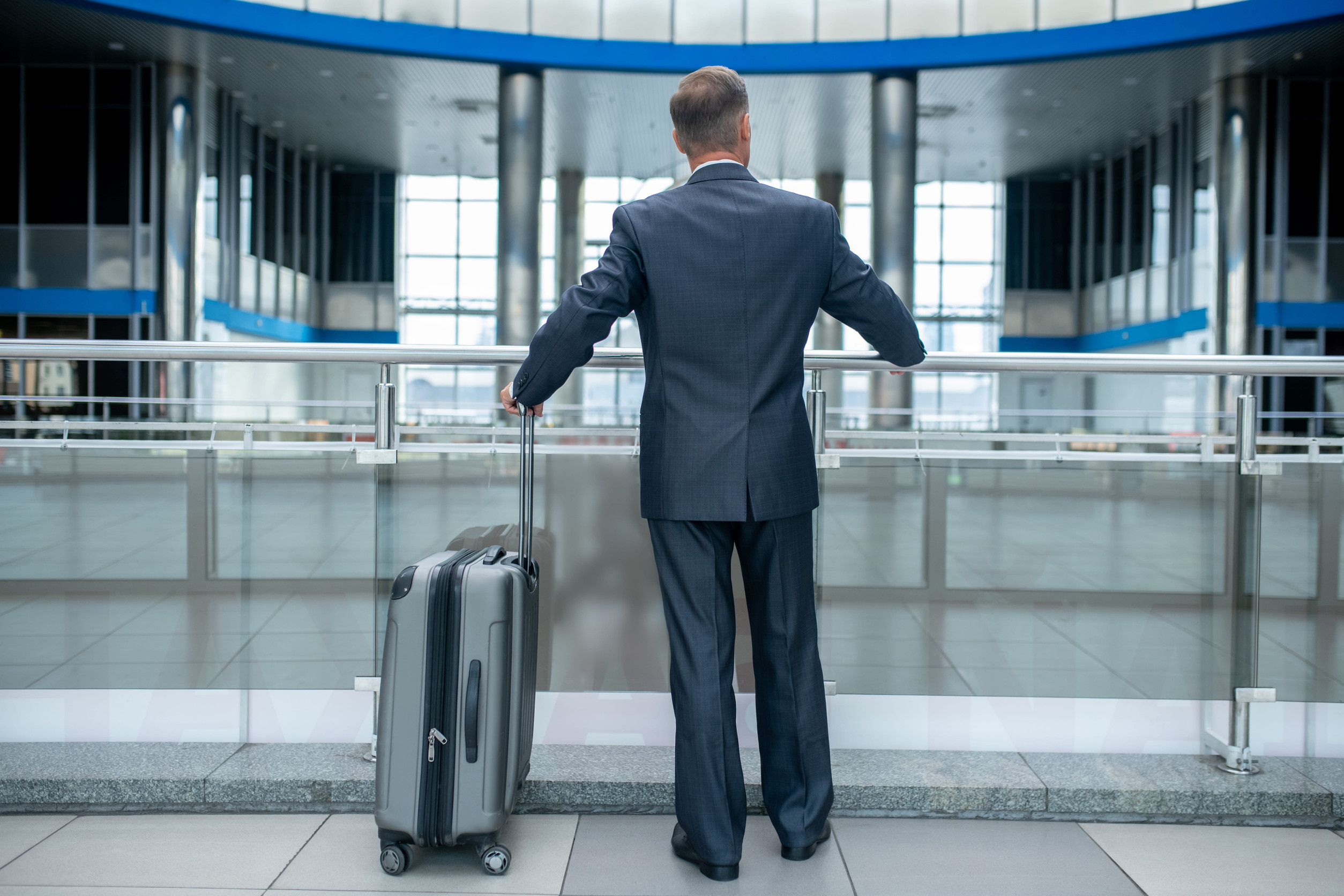 Businessman At The Airport Terminal