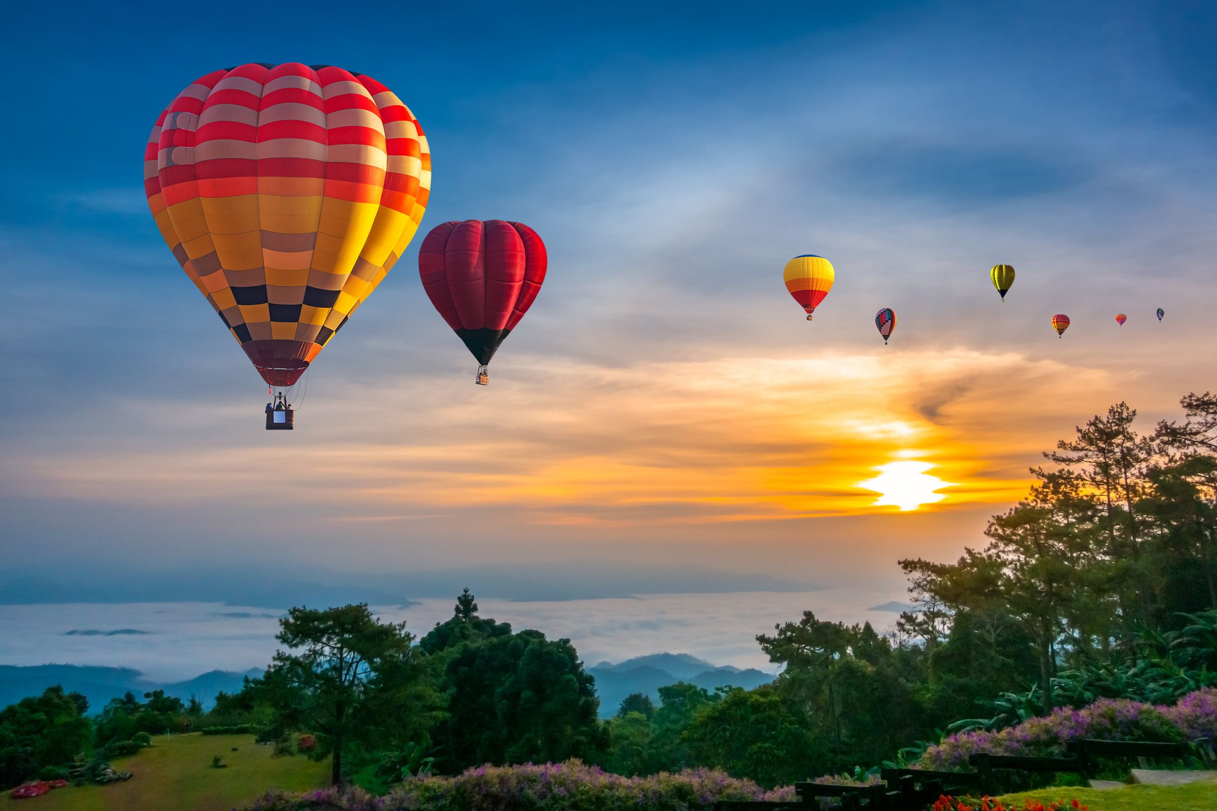 Colorful Hot Air Balloons Flying Over Mountain At Huai Nam