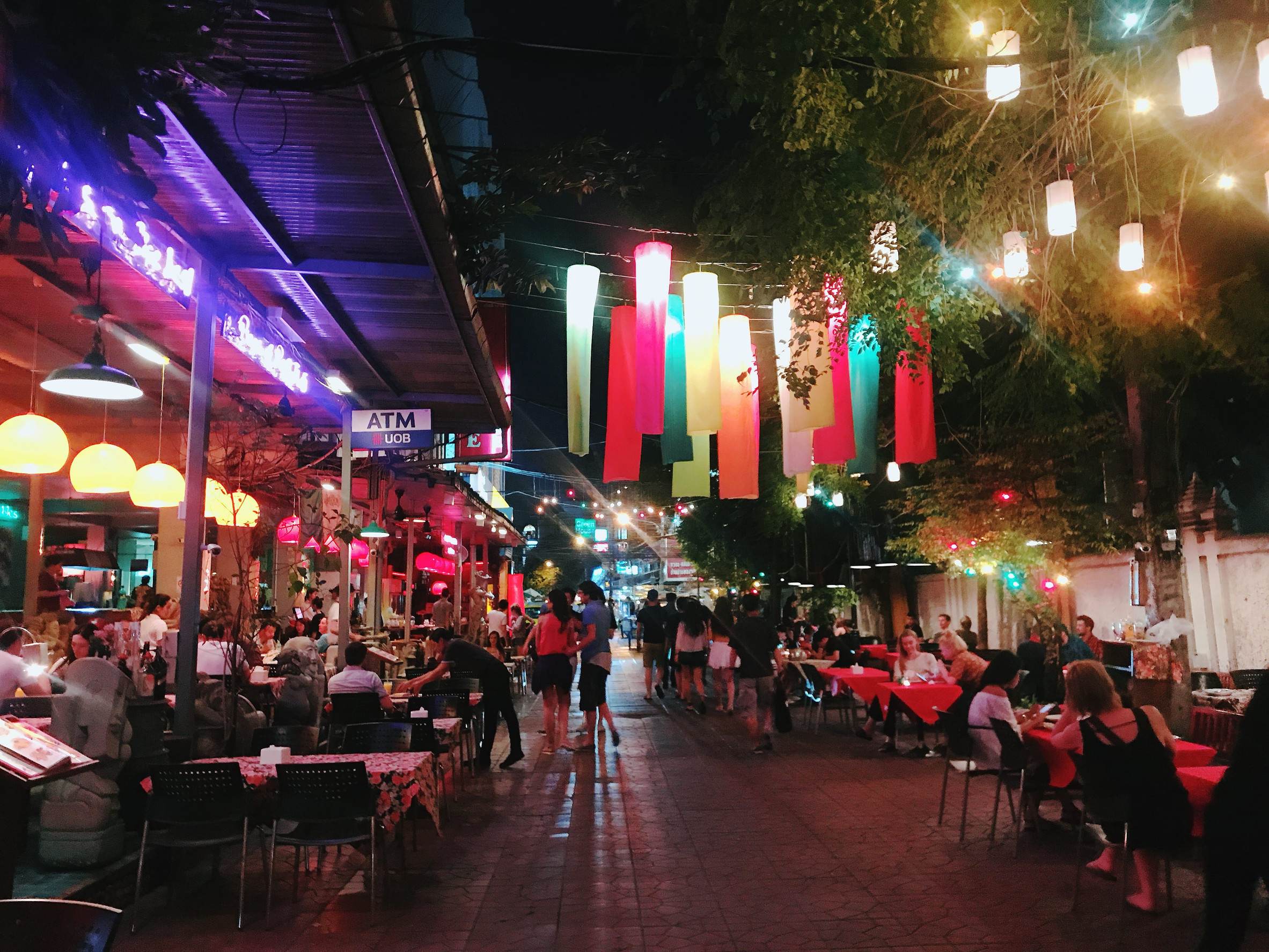 People Eating And Drinking At Night In Bangkok