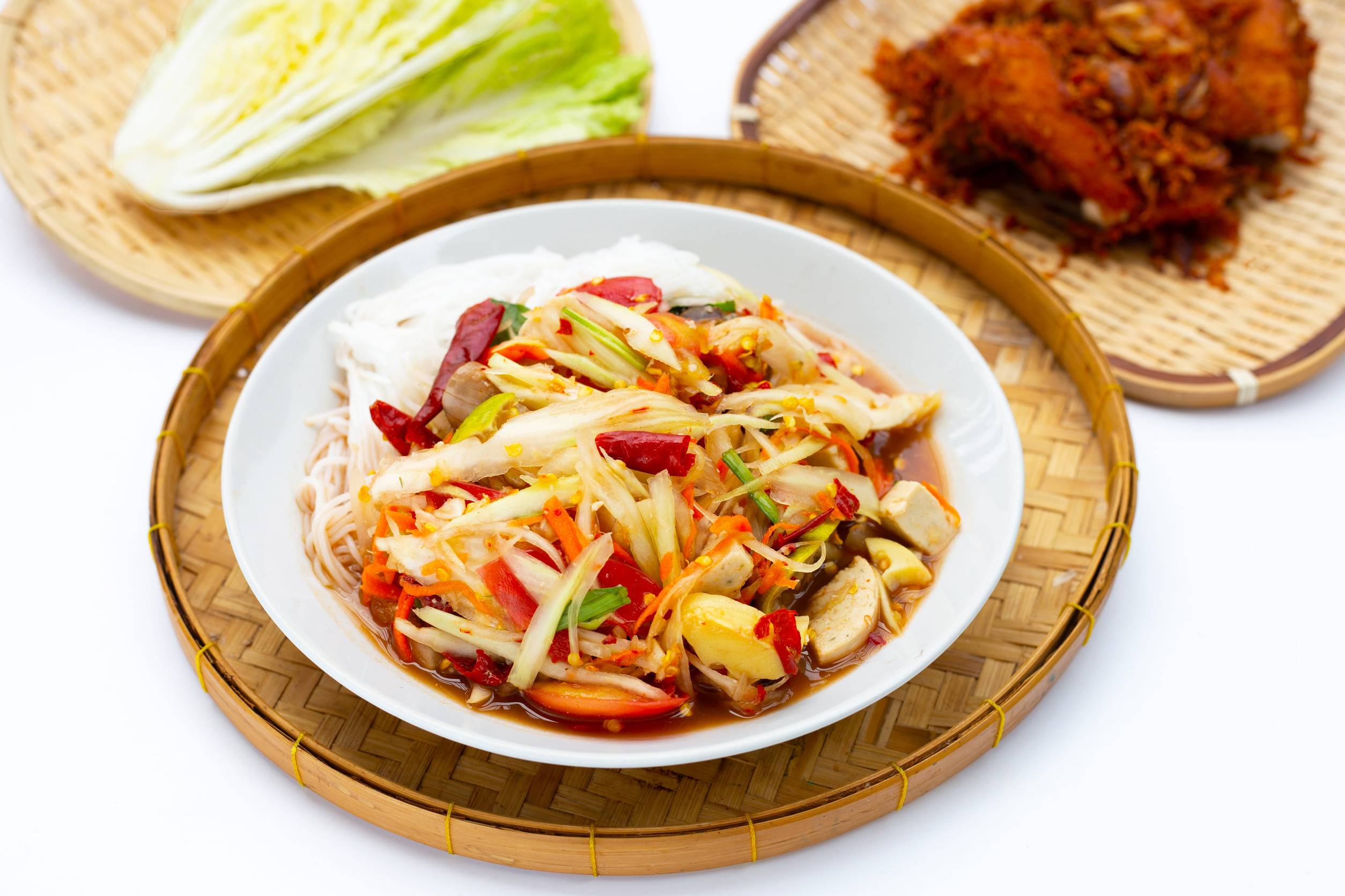 Som Tum Being Served With Additional Salad